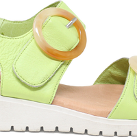Green sandal with a strap and white sole on a white background