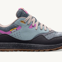 Blue and gray sneaker with purple accents on a white background