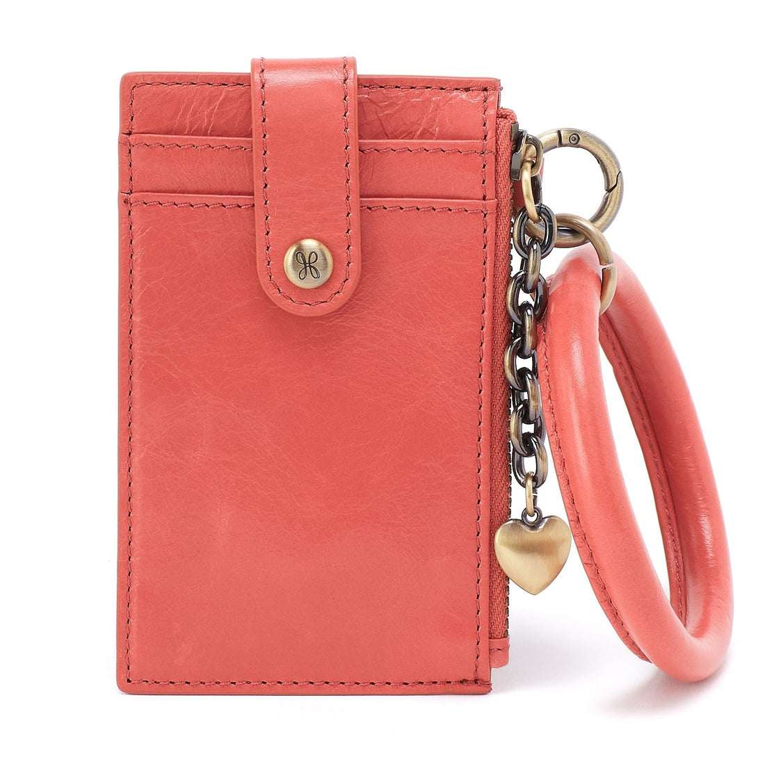 Pink leather wallet with a keychain on a white background